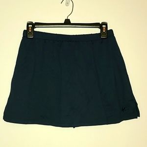 Navy tennis skirt with attached shorts